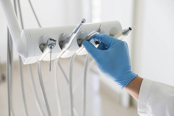Professional Tooth Extraction technician working in Minneapolis, KS